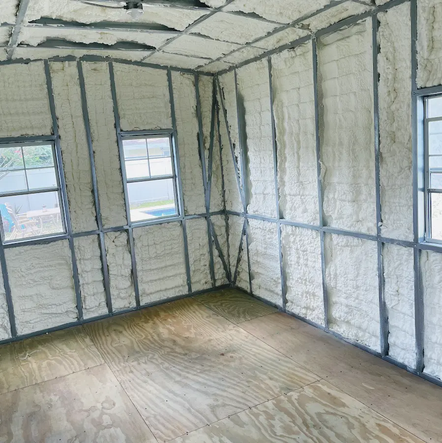 Closed-cell spray foam insulation applied to wall cavities in a residential project in Warsaw